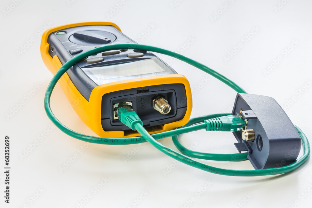 network tester with green RJ45 cable 5e connected for testing network tester with green RJ45 cable 5e connected for testing
