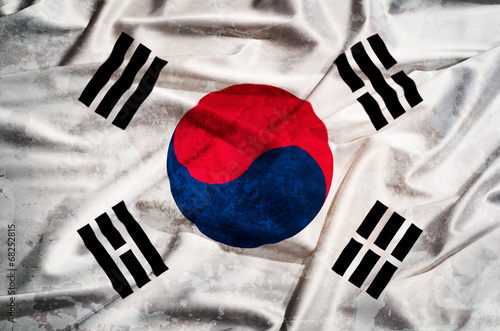 South korea gunge flag on a silk drape waving photo