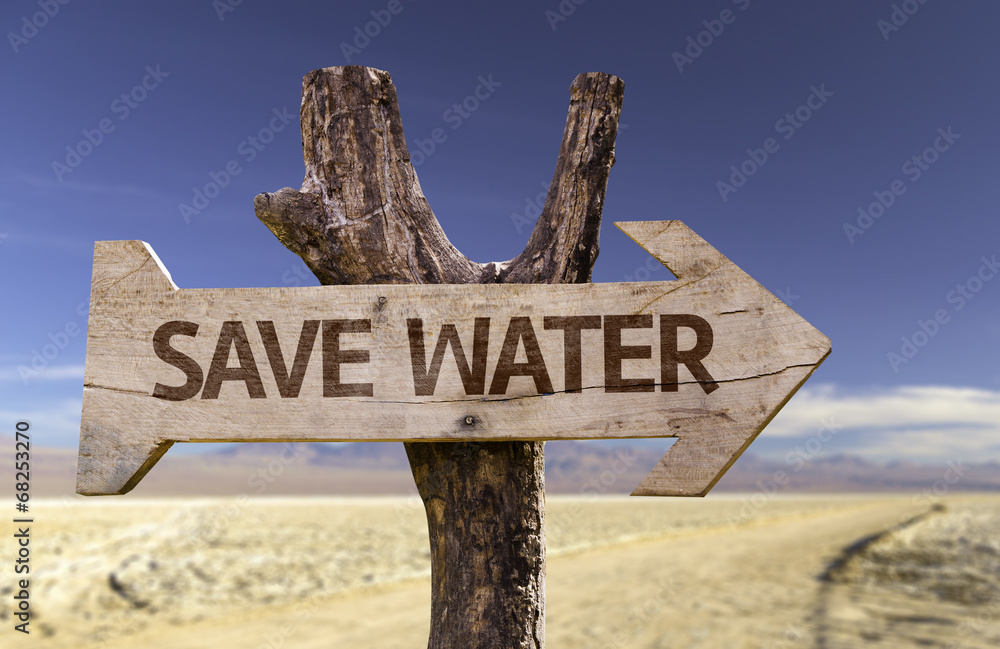 Save Water wooden sign isolated on arid background