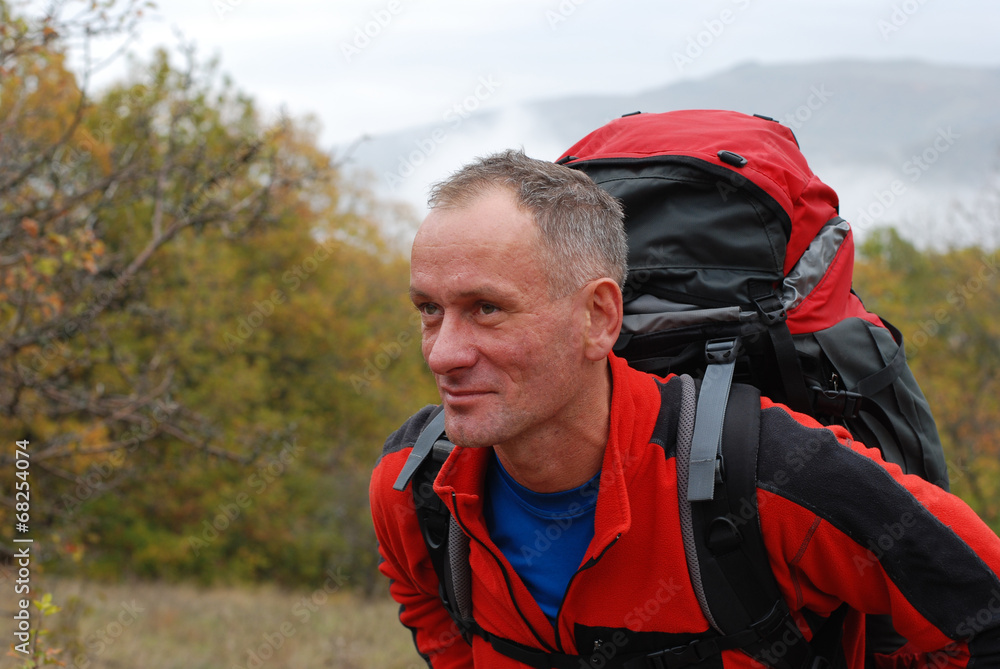 Backpackers in autumn mountains Backpackers in autumn mountains