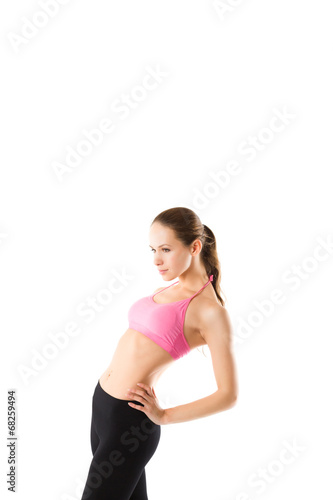 Fototapeta Naklejka Na Ścianę i Meble -  Young sexy athletic woman in sportswear  isolated