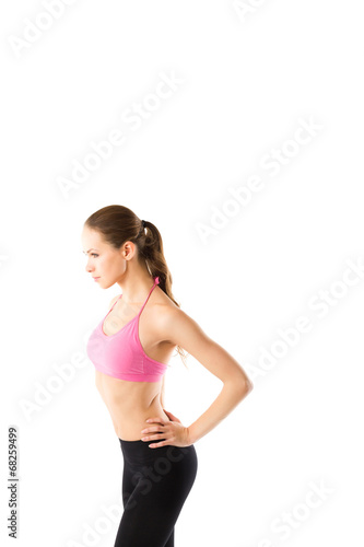 Fototapeta Naklejka Na Ścianę i Meble -  Young sexy athletic woman in sportswear  isolated on white backg