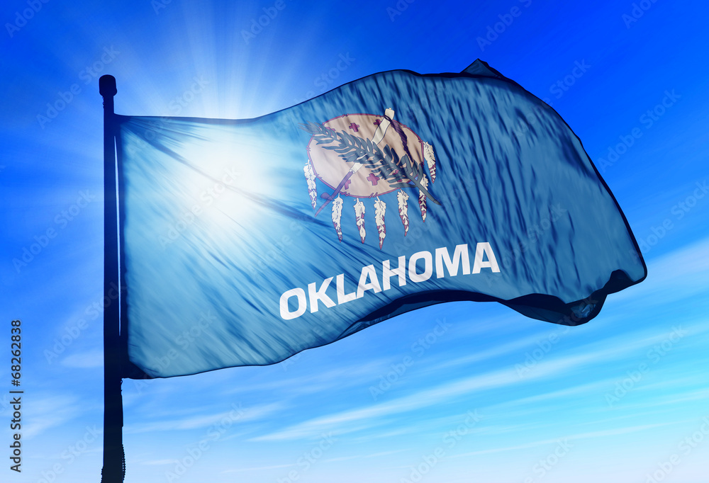 Naklejka premium Oklahoma (USA) flag waving on the wind