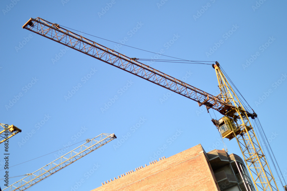 Construction of the new brick building by means of the elevating Construction of the new brick building by means of the elevating