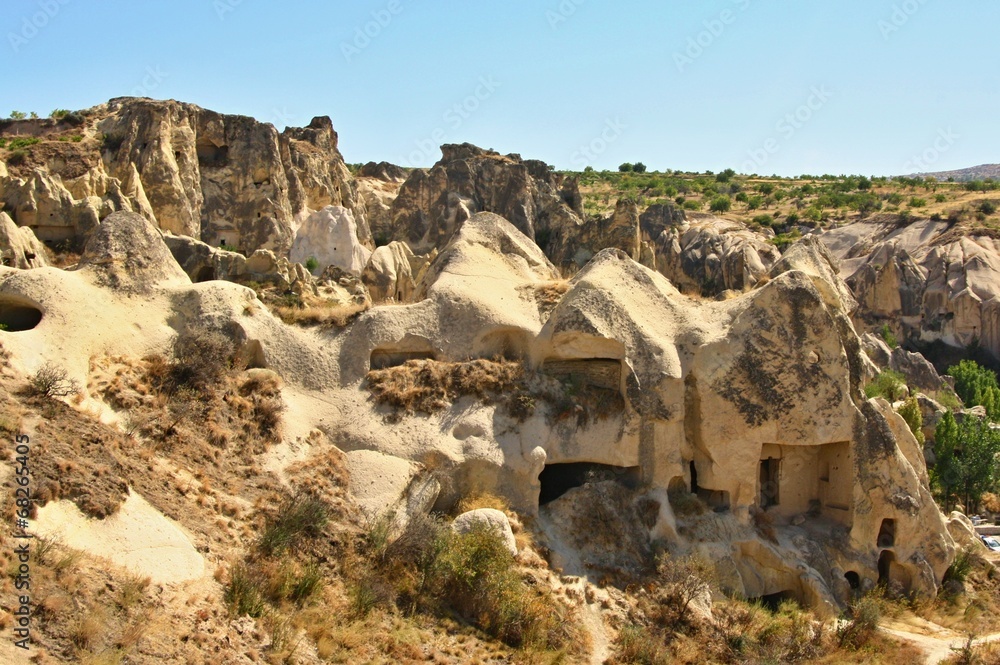 House carved in typical rock formation in Cappadocia, Turkey