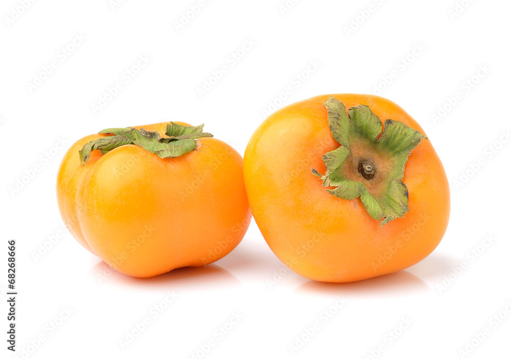 ripe persimmons isolated on white background ripe persimmons isolated on white background