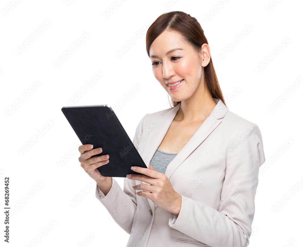 Asian businesswoman read on digital tablet Asian businesswoman read on digital tablet