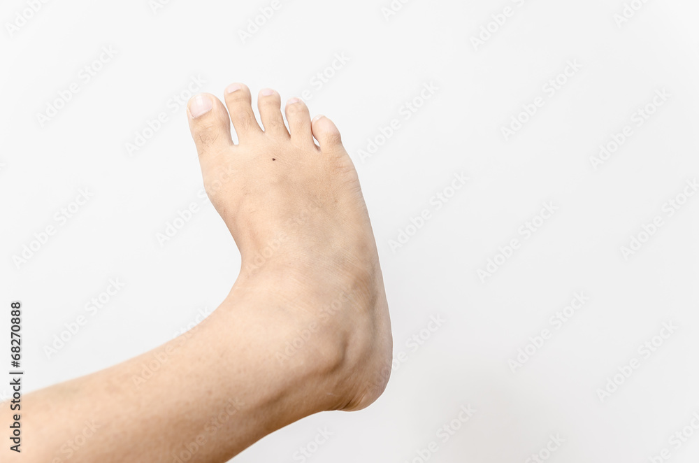 Beautiful female a foot and a heel on a white background Beautiful female a foot and a heel on a white background