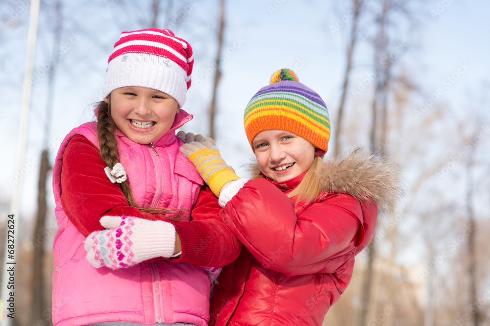 girls in a winter park