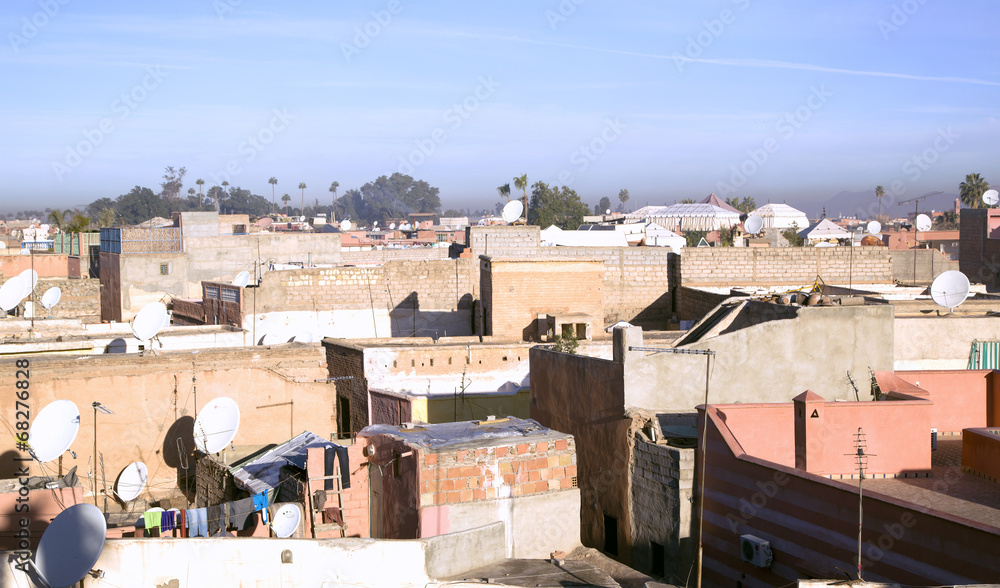 Marrakesh rooftops on a background Atlas Mountains