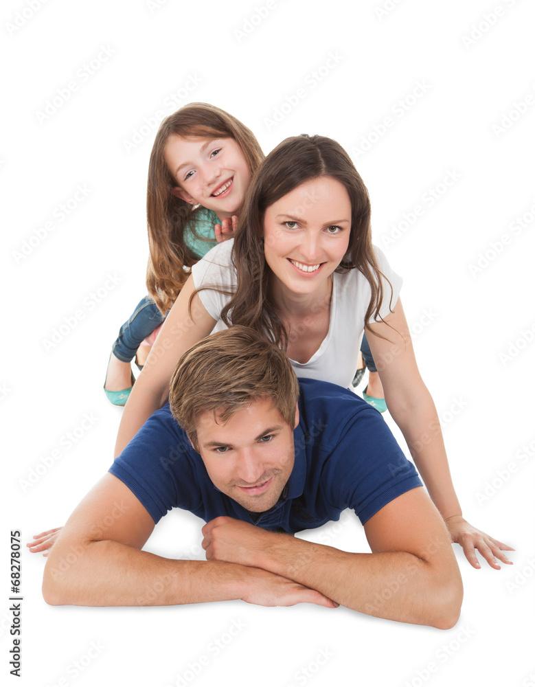 Portrait Of Playful Family Piling Each Other Portrait Of Playful Family Piling Each Other