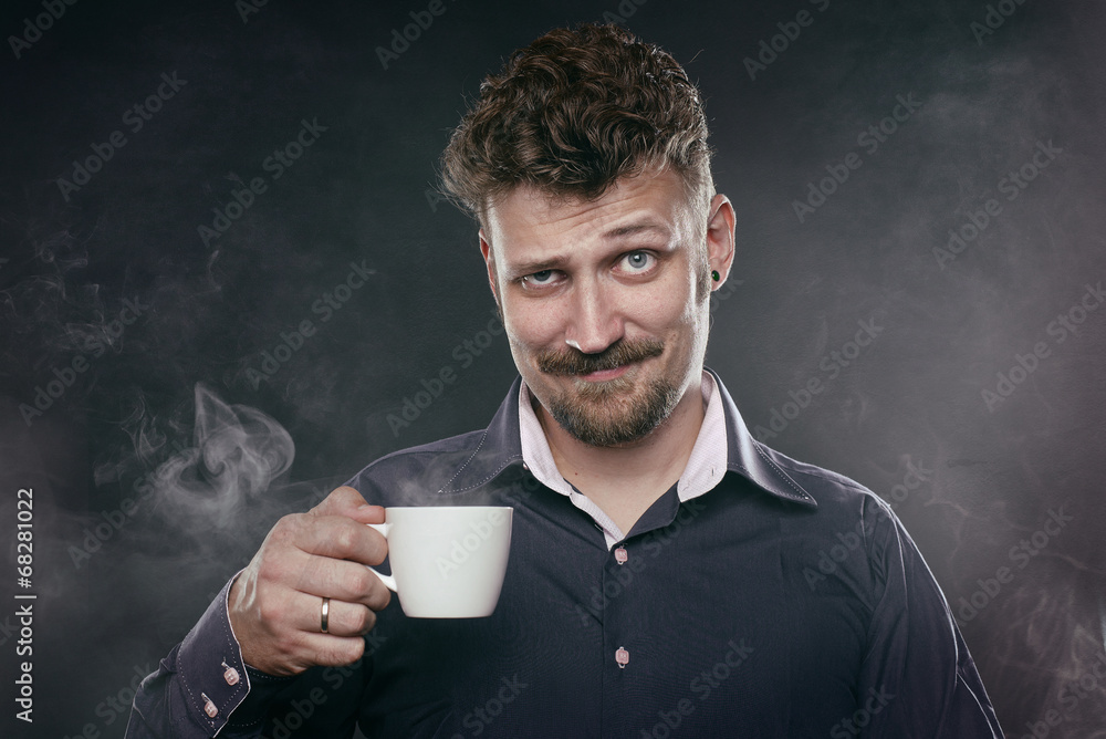 Handsome beard man stand in fog with cup of coffee in his hand - obrazy, fototapety, plakaty 