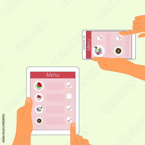 Man and woman are ordering food using gadgets in restaurant