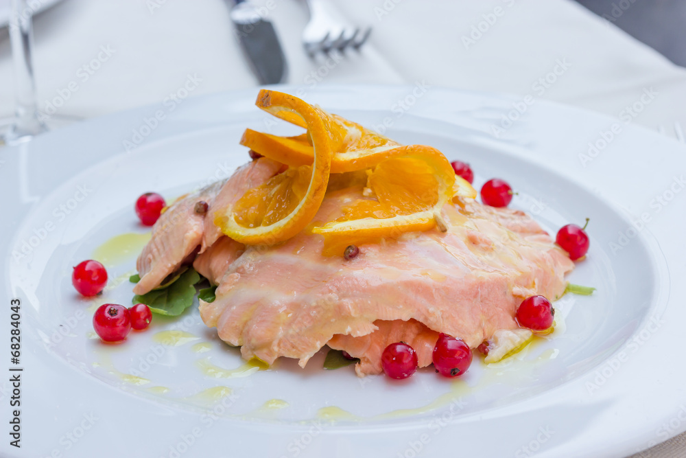 Salmon marinated into orange