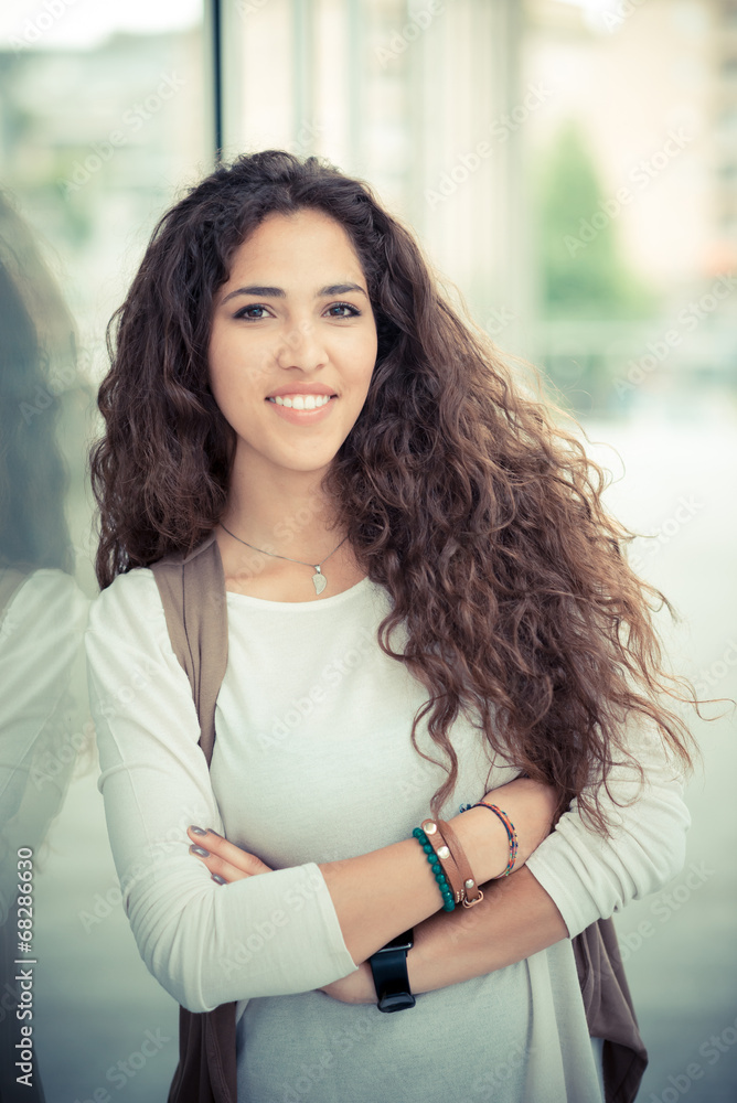 Fototapeta premium beautiful curly long brunette hair moroccan woman