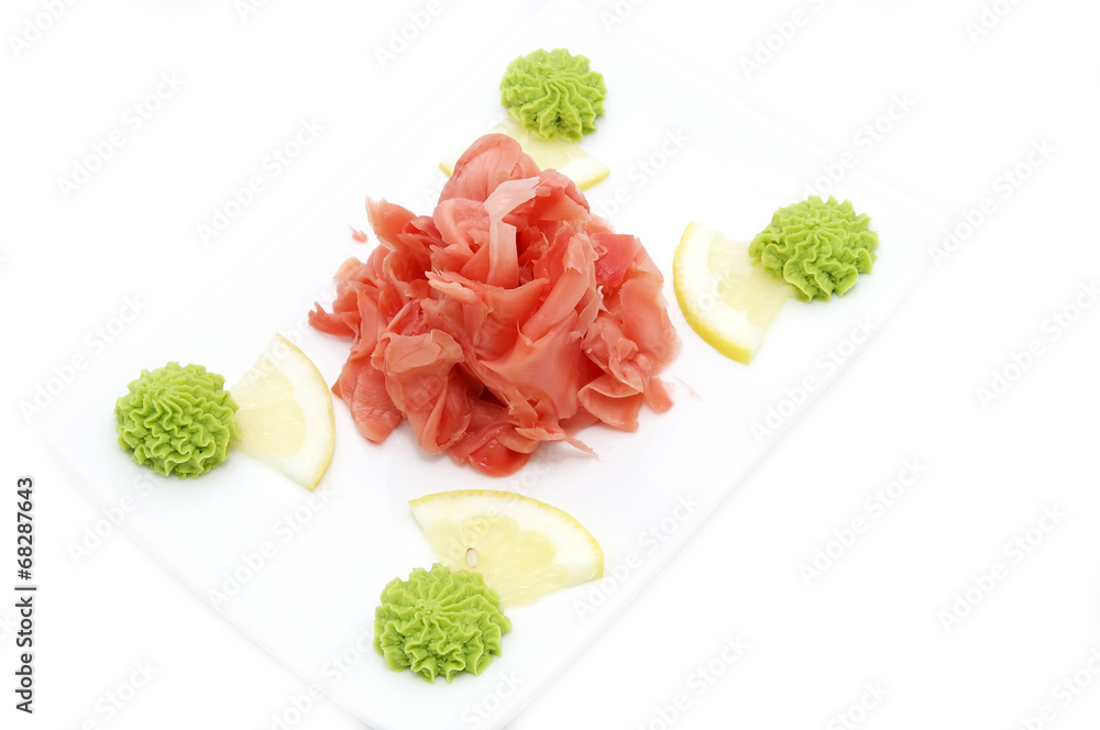 plate with ginger on a white background plate with ginger on a white background