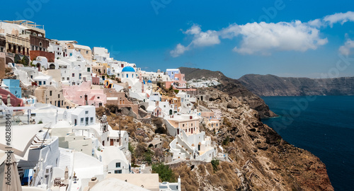 Fototapeta Naklejka Na Ścianę i Meble -  Houses on the hillside in the the Greek island of Santorini