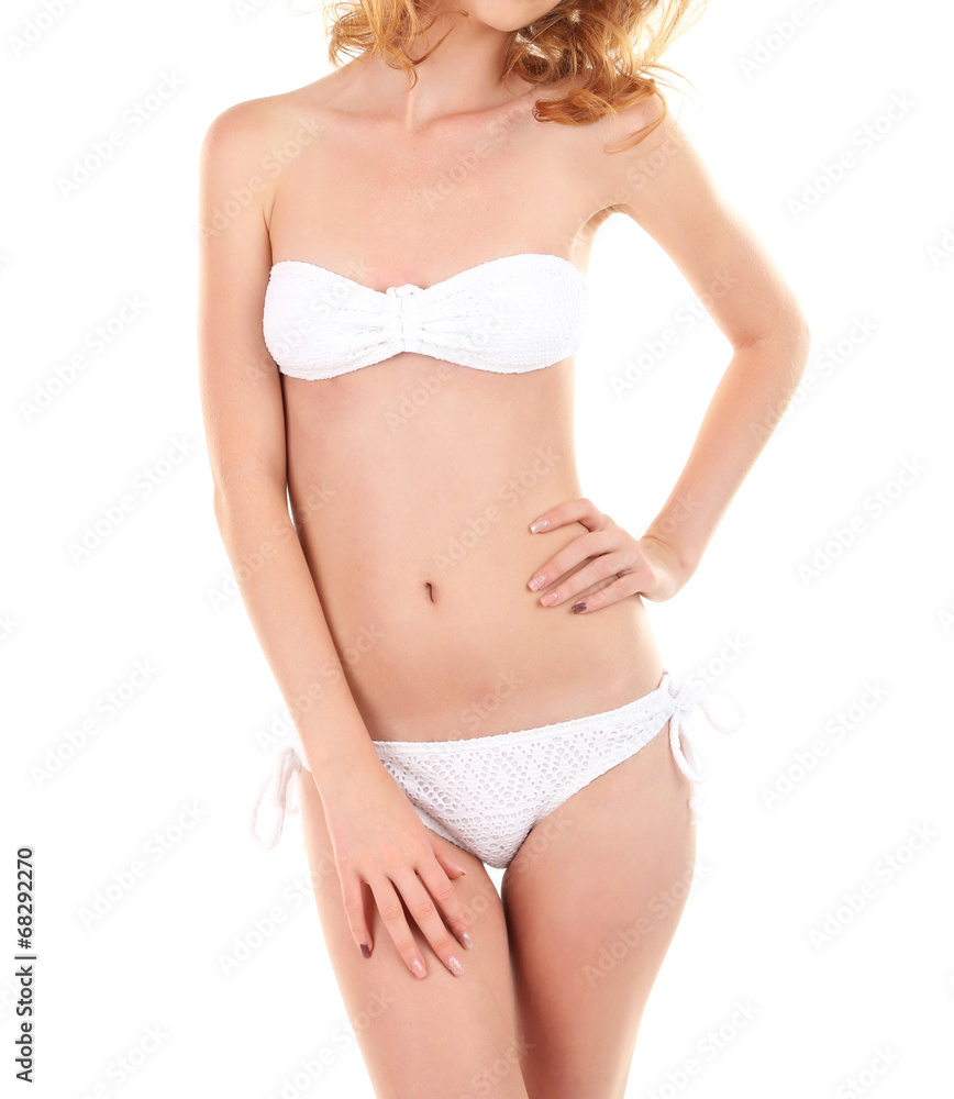 Young woman with slim body in swimsuit isolated on white Young woman with slim body in swimsuit isolated on white