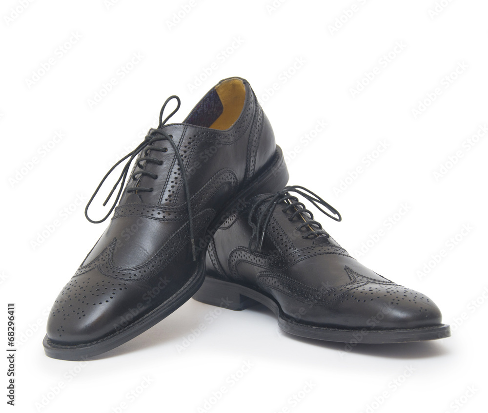 The black man's shoes isolated on white background. The black man's shoes isolated on white background.
