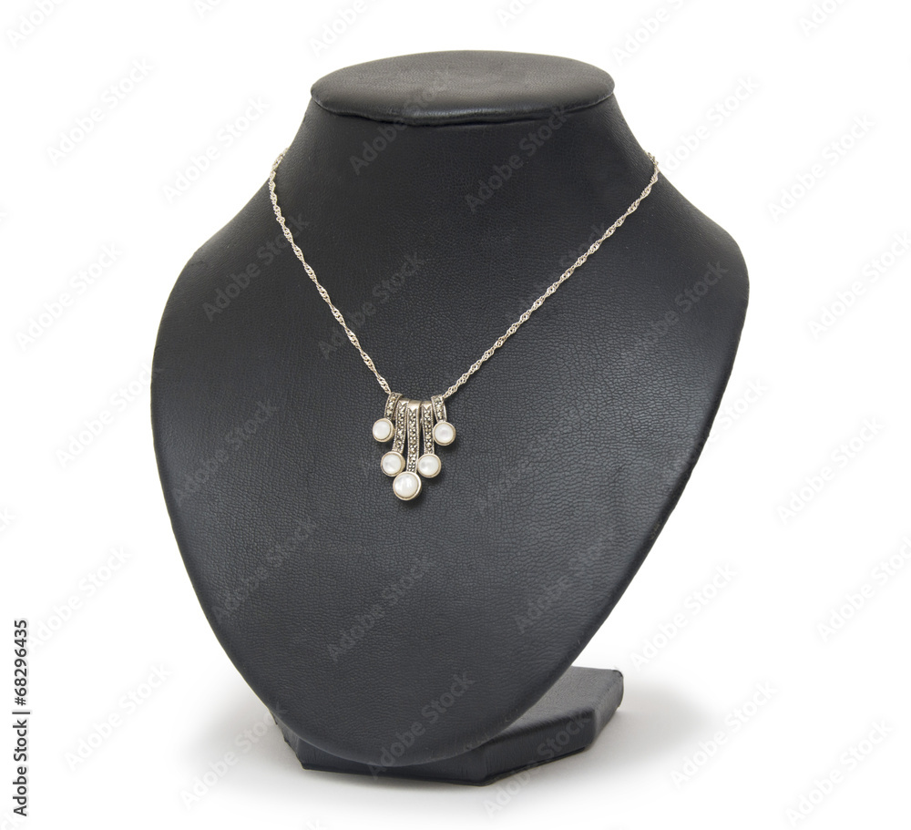 beautiful silver necklace on mannequin isolated on white