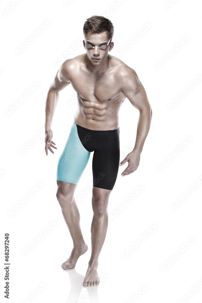 Young attractive caucasian man swimmer with goggles