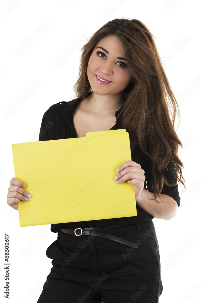 Pretty hispanic young student holding a yellow folder Pretty hispanic young student holding a yellow folder