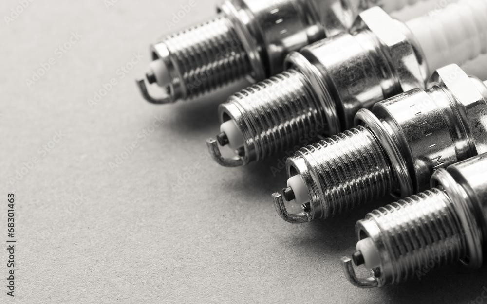 Auto service. Set of spark plugs as spare part of car. Auto service. Set of spark plugs as spare part of car.