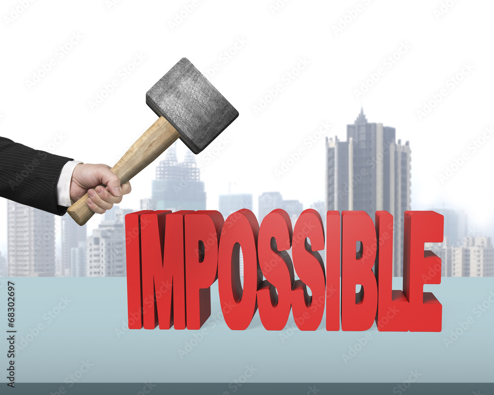 Hand holding hammer to creak impossible 3D word Hand holding hammer to creak impossible 3D word