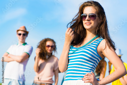 stylish young woman in sunglasses