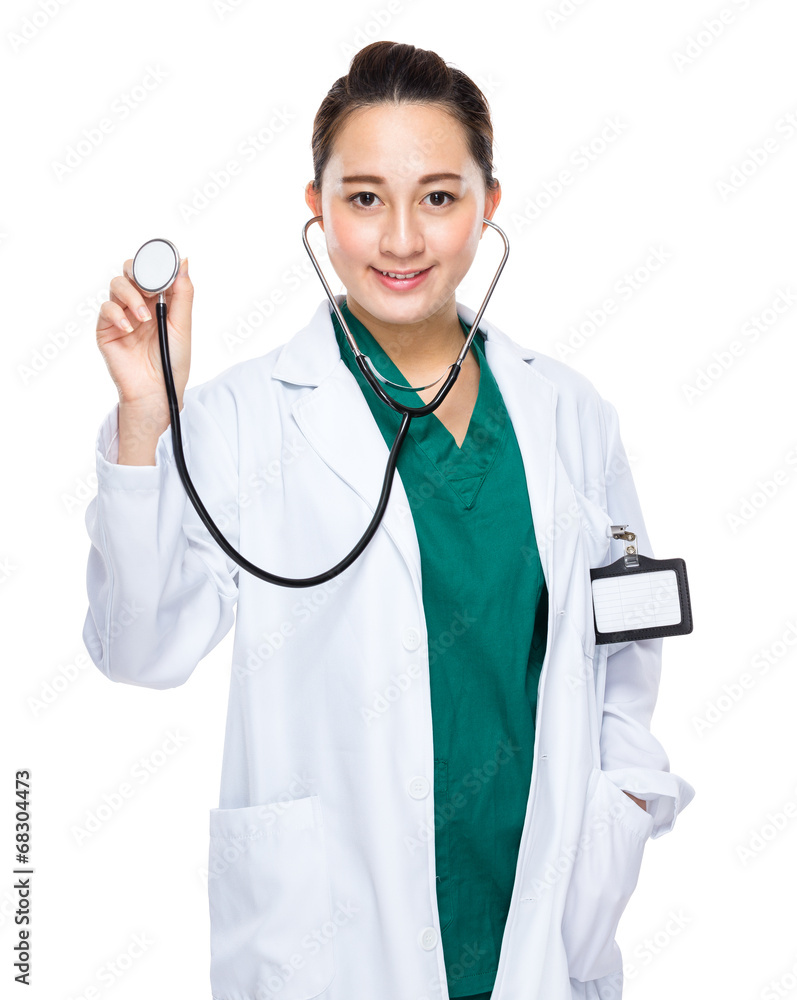 Indonesian mixed race woman doctor hold stethoscope Indonesian mixed race woman doctor hold stethoscope