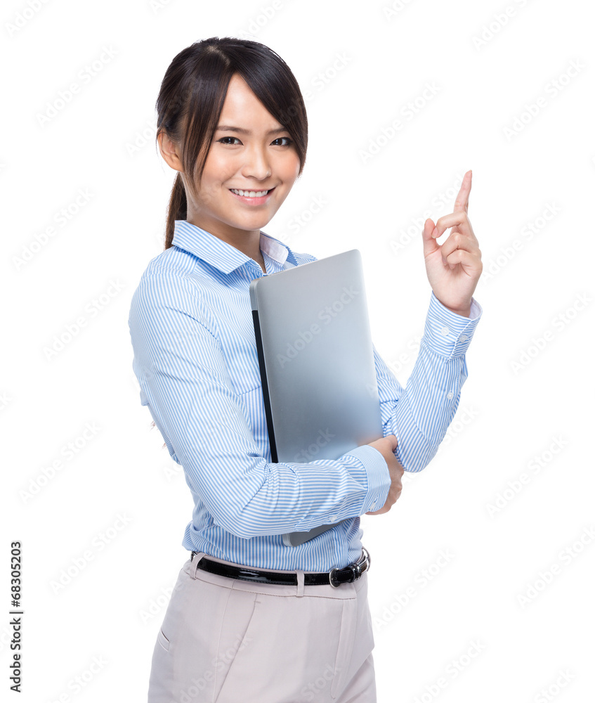 Businesswoman with notebook computer and finger up Businesswoman with notebook computer and finger up
