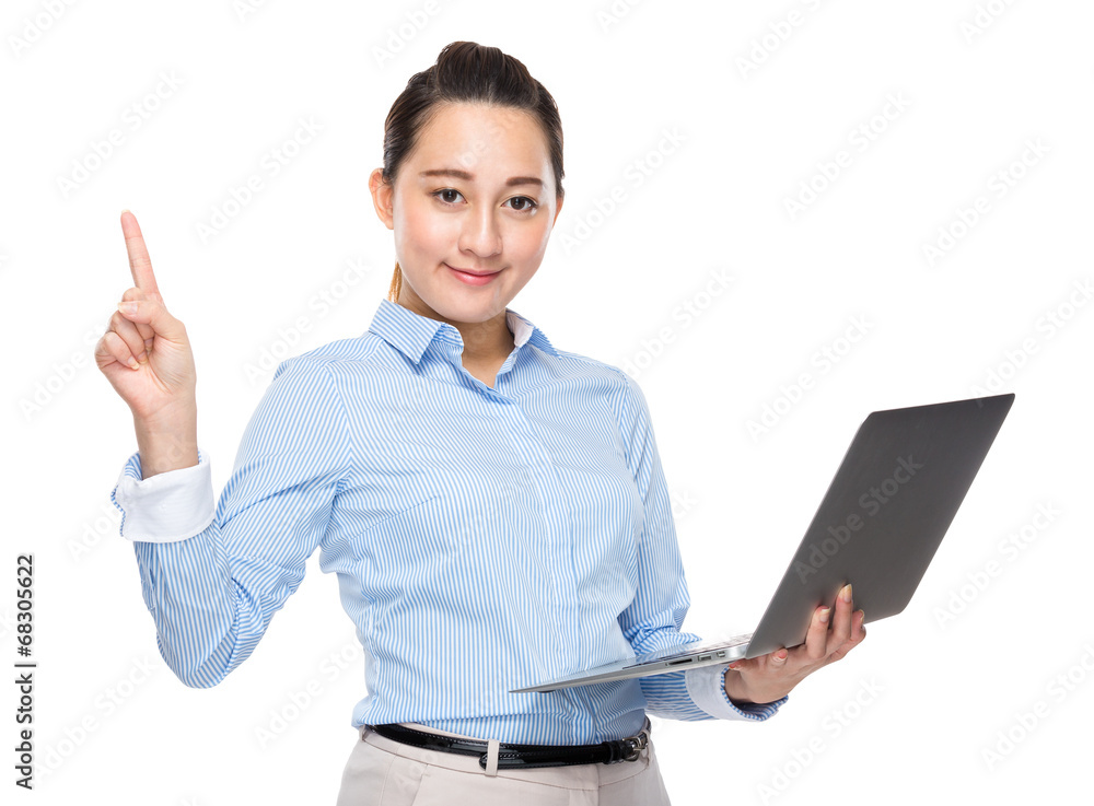 Business woman use laptop computer and finger point out
