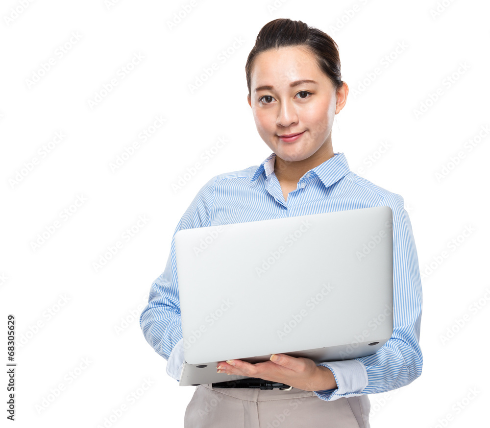 Indonesian mixed race business woman hold laptop computer Indonesian mixed race business woman hold laptop computer