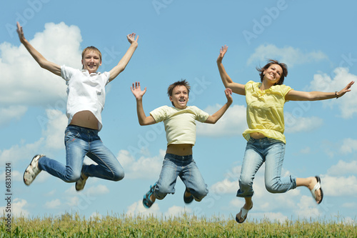 Mother and children jumping