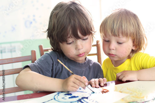 Children draw in home