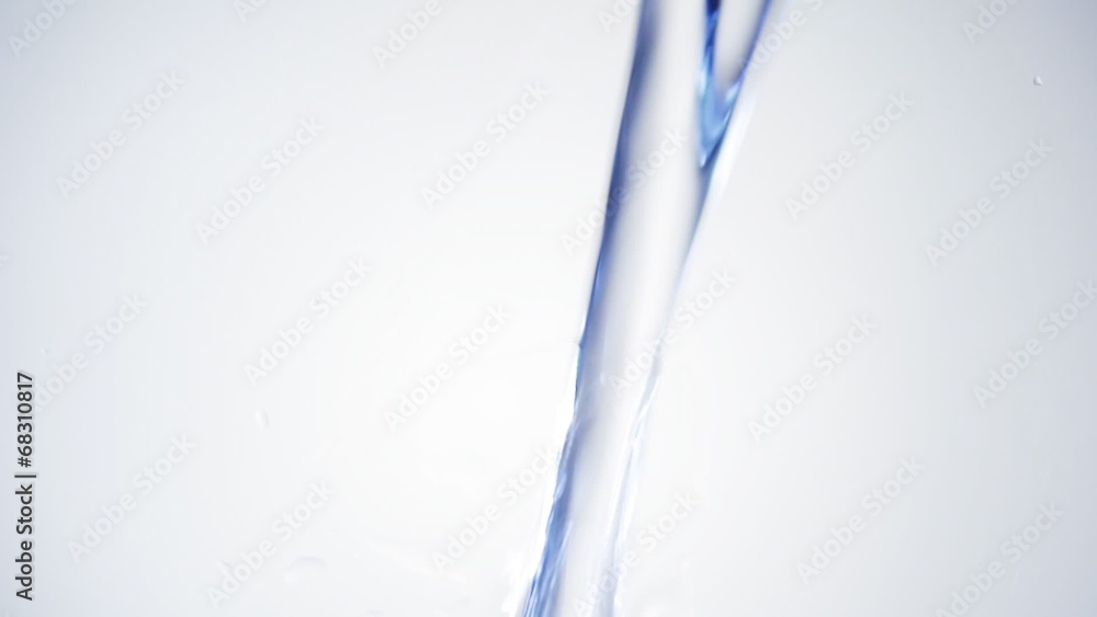 water is poured on a white background close-up water is poured on a white background close-up