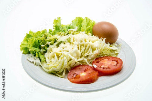fresh salad in a white plate