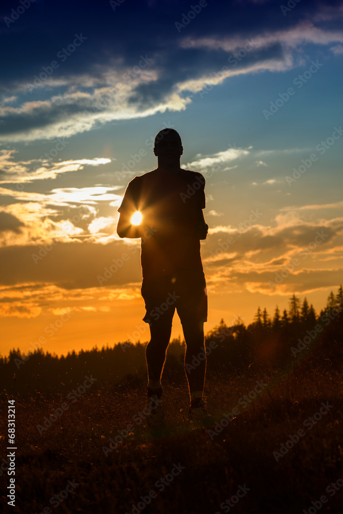 silhouette of a jogger