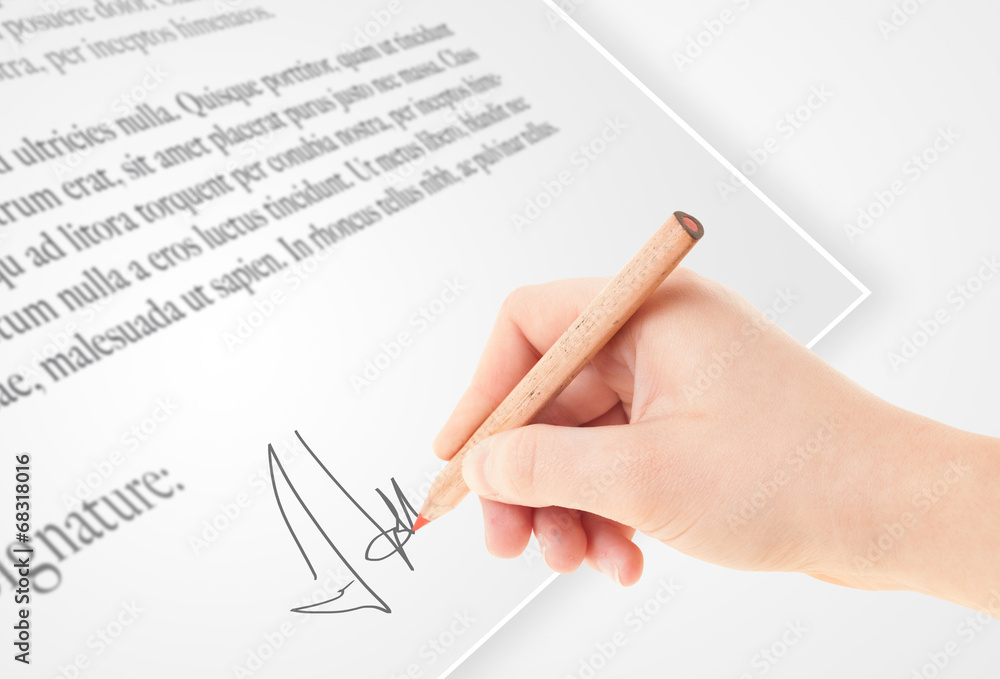 Hand writing personal signature on a paper form Hand writing personal signature on a paper form