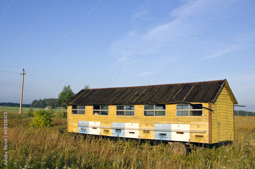 apiary hives  truck trailer in  field
