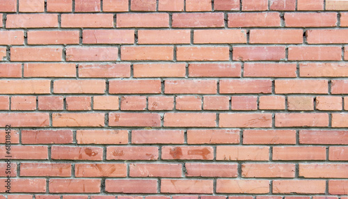 background texture of rough brick wall of red color