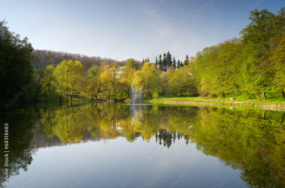 Monastery on the hill by the pond