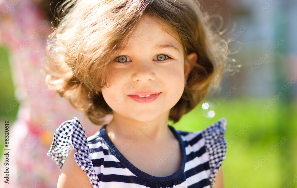 Cute little girl is playing in playground Cute little girl is playing in playground