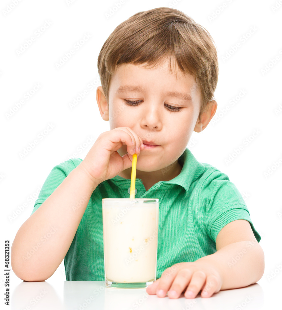 Cute little boy with a glass of milk Cute little boy with a glass of milk