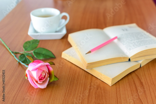 pink rose with book and coffee