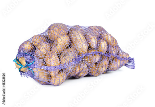 Raw potatoes in a sack photo