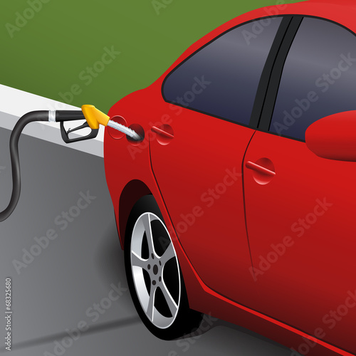 red car with a shadow on a gas station