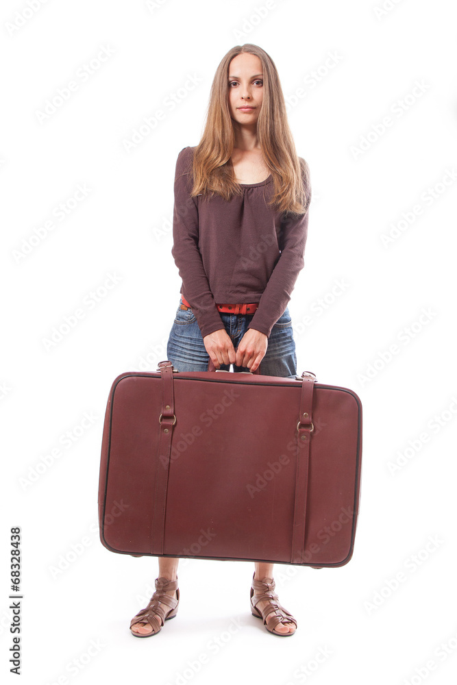 Girl standing with suitcase. Isolated on white Girl standing with suitcase. Isolated on white