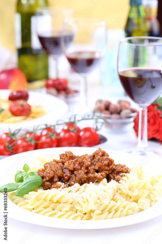 pasta bolognese with basil and wine