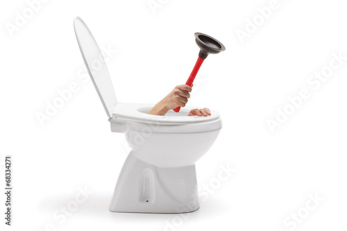Canvas Print Hand with a rubber suction cup coming out from toilet bowl